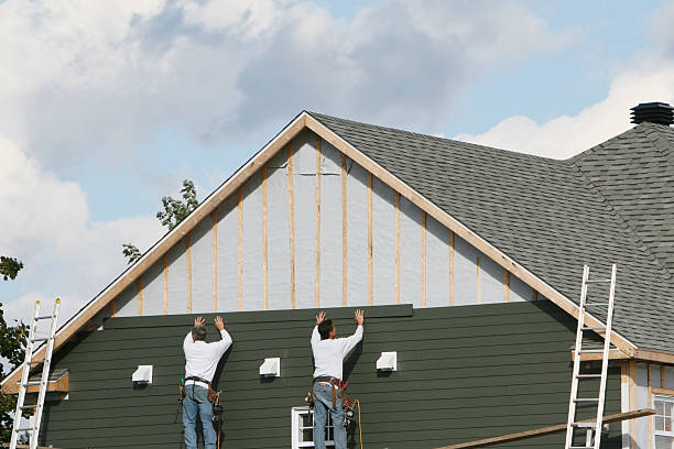 Professional Emergency Siding Repair technician working in Wheeling, WV